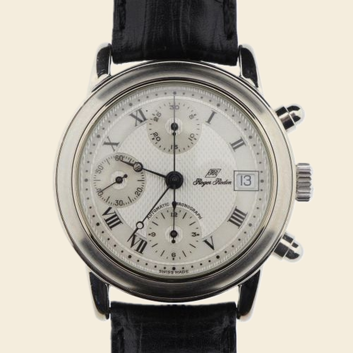 Roger Rodin Automatic Chronograph, stainless steel case, guilloché silvered dial, Roman numerals, on black crocodile leather strap. Swiss Made.